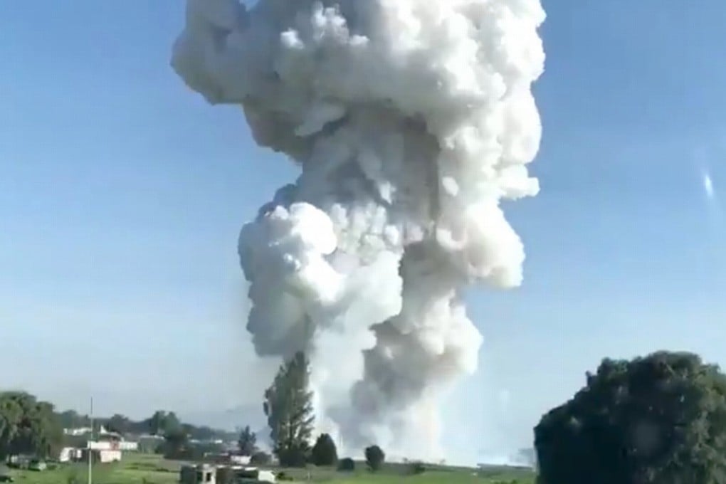 Smoke rises after fireworks blast in Tultepec, outside Mexico City, on Thursday in this picture grab obtained from social media video. Photo: David Villanueva / Reuters