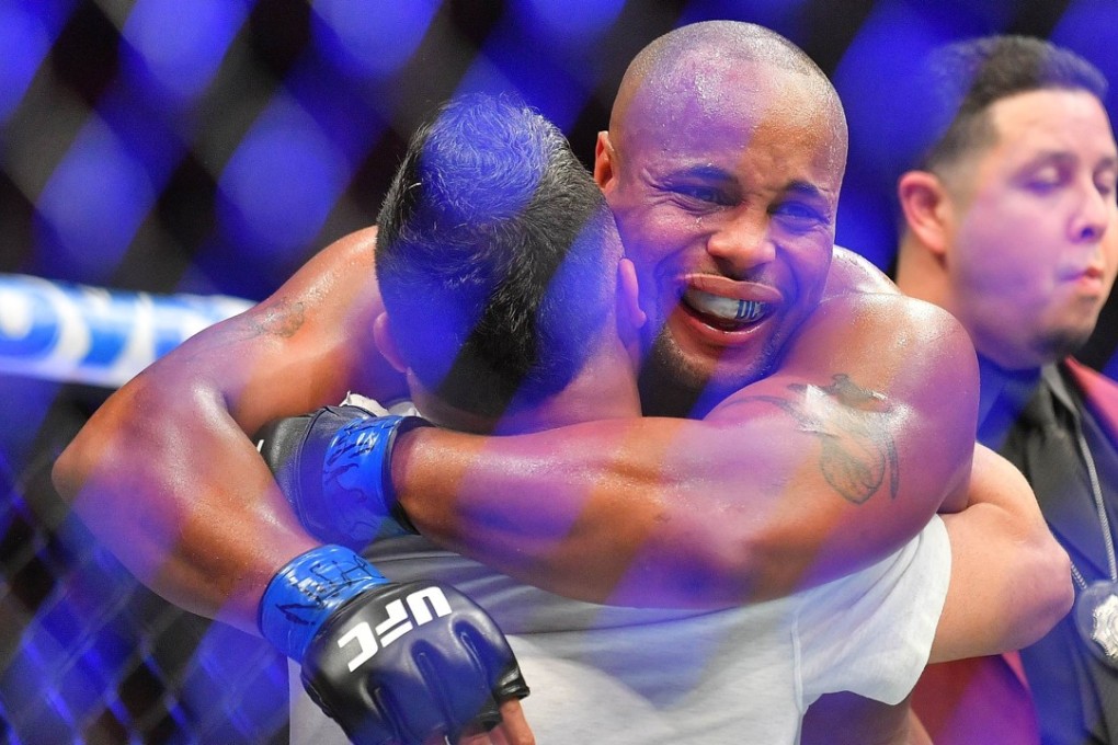 Daniel Cormier celebrates after becoming a two-weight champion following his victory over Stipe Miocic. Photo: AFP