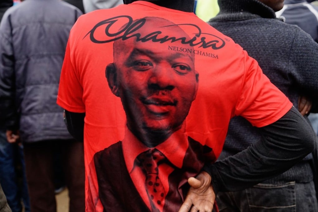 A supporter wears a T-shirt showing the face of Movement for Democratic Change Alliance leader Nelson Chamisa at an election rally. Photo: AFP