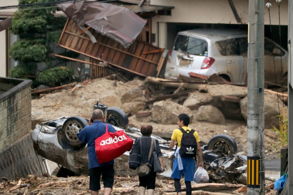 Residents of Hiroshima on Sunday after a heavy rainfall that wreaked havoc in western Japan. Photo: EPA-EFE