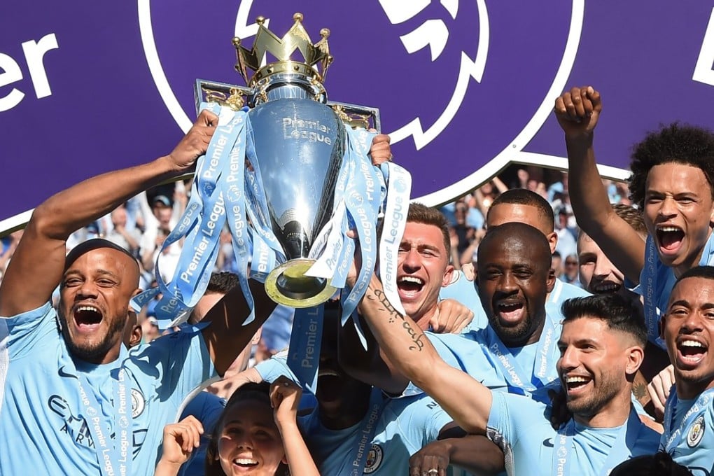 Manchester City celebrate winning the Premier League last season. Photo: AFP