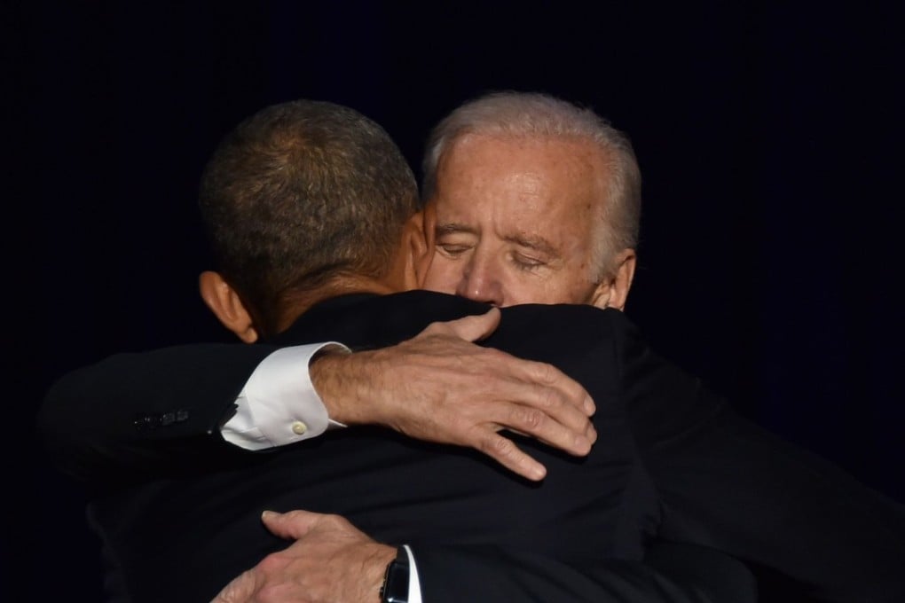 US President Barack Obama hugs Vice-President Joe Biden after the Obama delivered his farewell address in Chicago on January 10, 2017. Photo: AFP