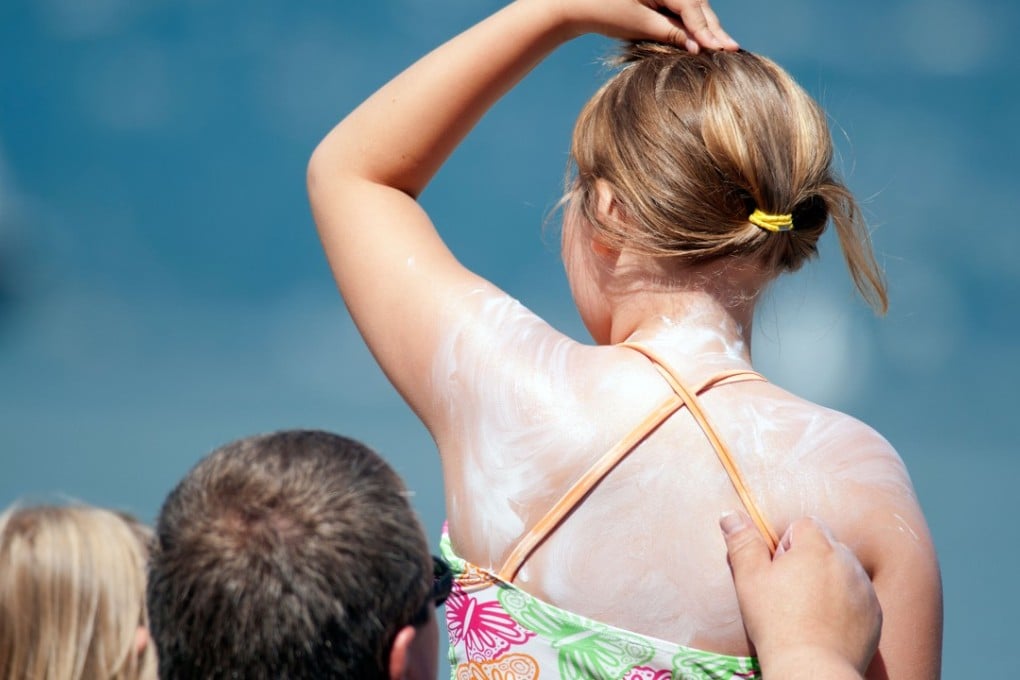 There are a number of ways we can protect our children from the sun, most obviously with sun cream. Photo: Alamy