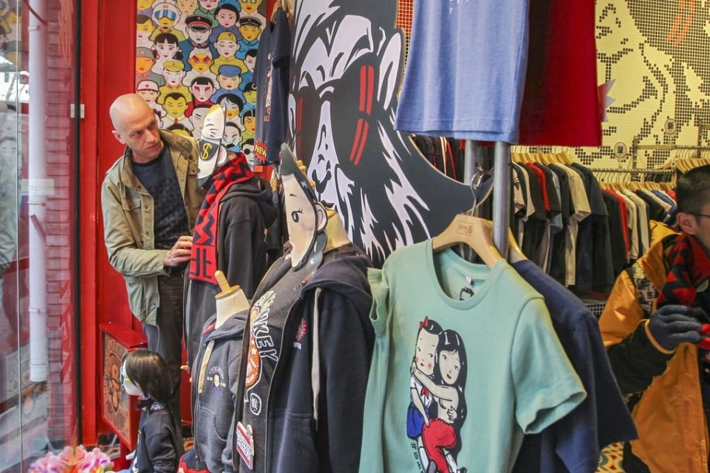 Dominic Johnson-Hill at his Plastered 8 shop in Nanluoguxiang, a hutong in downtown Beijing. Photo: Simon Song
