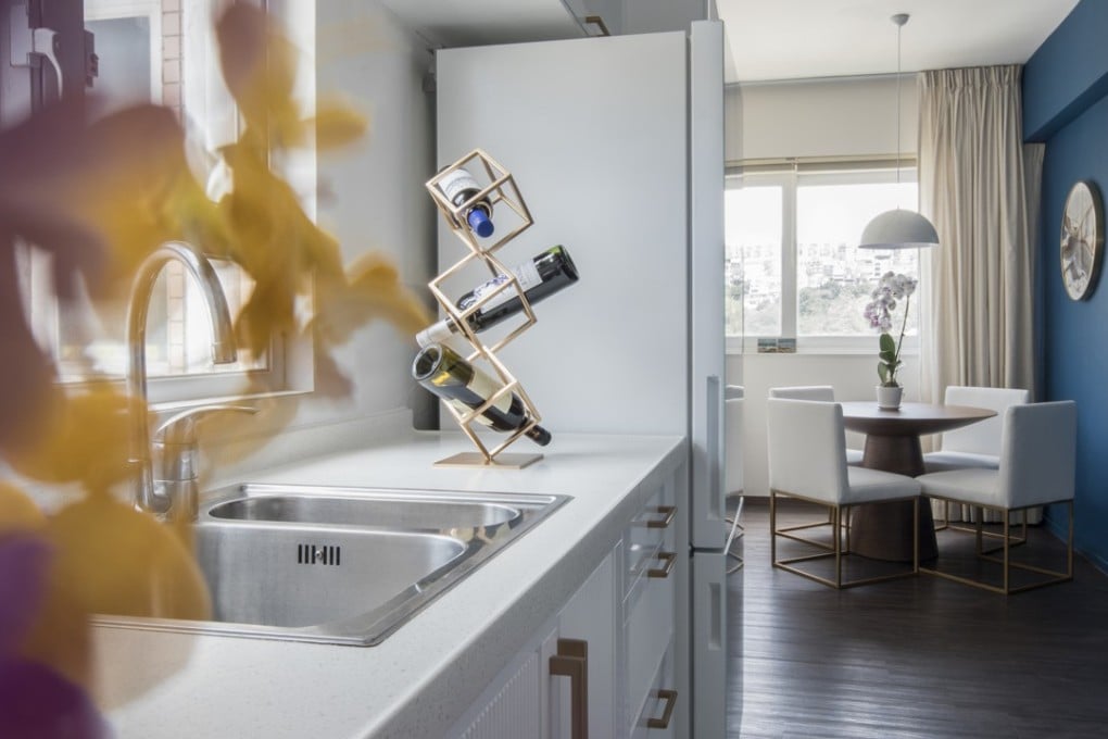 The light-filled kitchen leads into the open-plan living-dining area. Photography: Monika Kulon