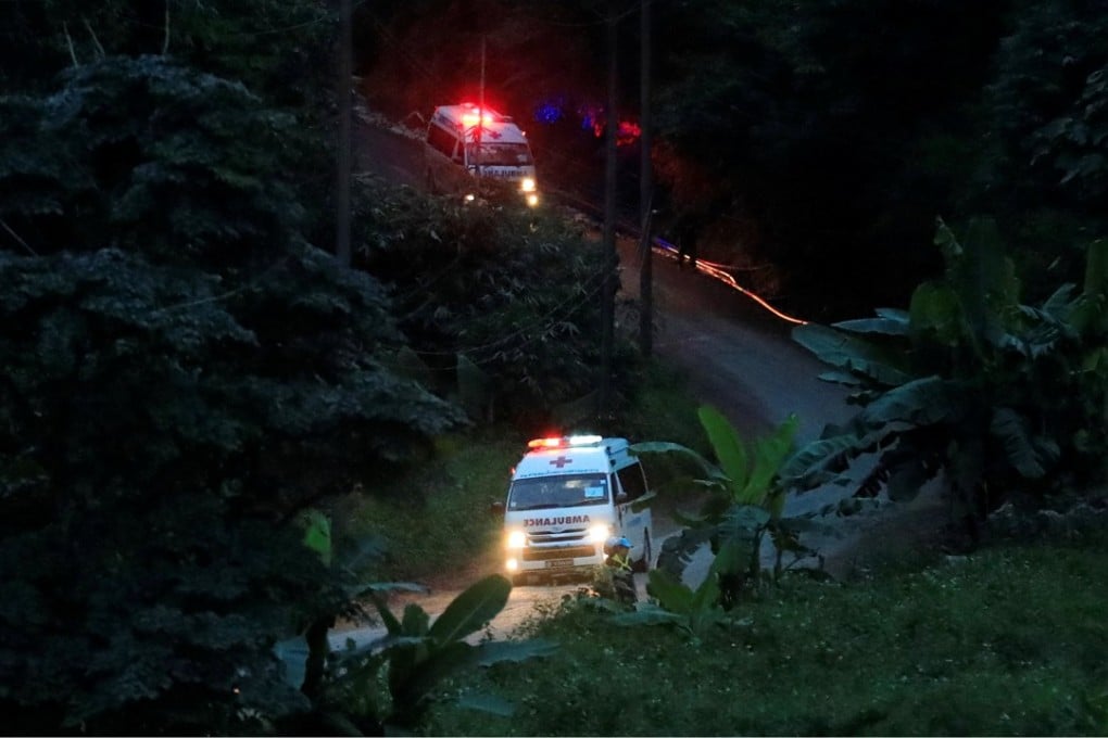 Two ambulances leave the Tham Luang cave complex carrying rescued boys on July 9, 2018. Photo: Reuters