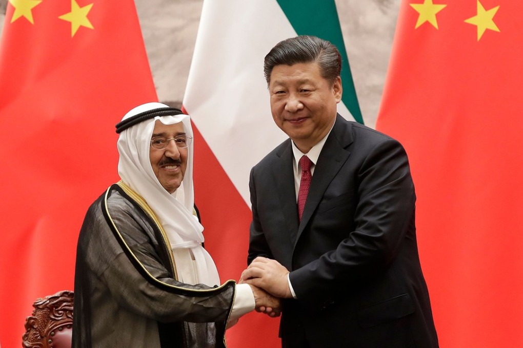 Kuwaiti Emir Sheikh Sabah Al-Ahmad Al-Jaber Al-Sabah shakes hands with Chinese President Xi Jinping after a signing ceremony at the Great Hall of the People in Beijing on Monday. Photo: AFP