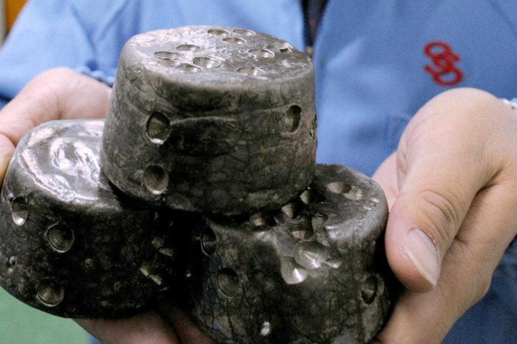 In this undated photo, chunks of chemically processed rare earths are shown in Beijing. China produced more than 80 per cent of the world’s rare earth metals and compounds last year, according to the US Geological Survey. Photo: AP