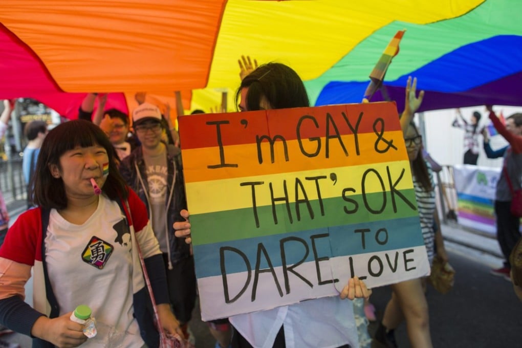 Marchers take part in the Hong Kong gay pride parade in November 2012. The lack of legal protection means members of Hong Kong’s LGBT community do not enjoy the same civil rights as their heterosexual peers. Photo: EPA