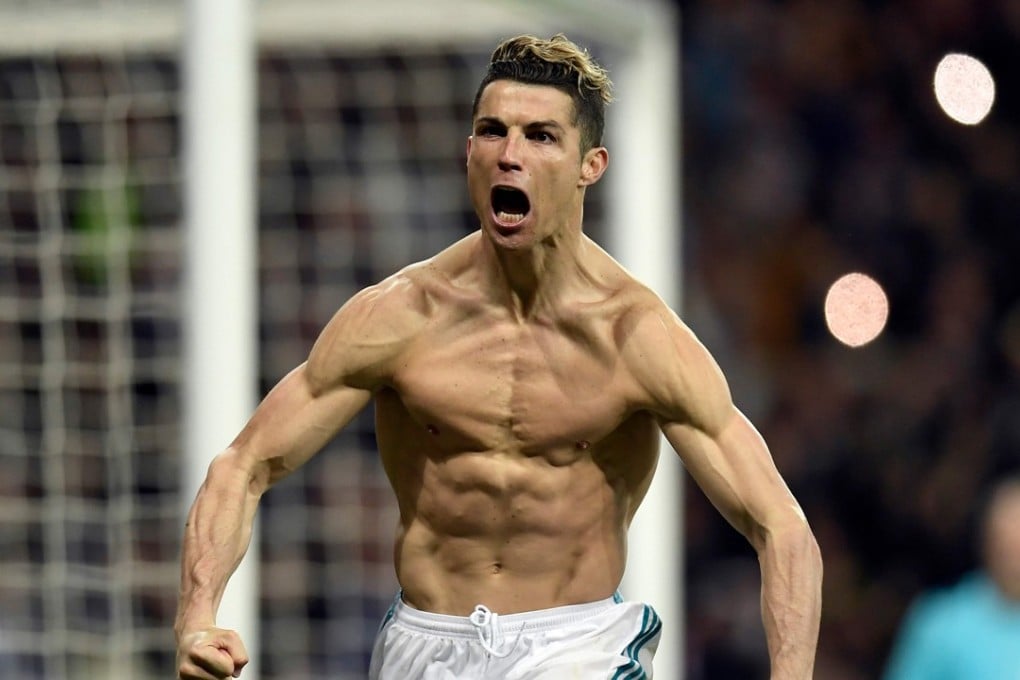 Cristiano Ronaldo celebrates after scoring a penalty during the Champions League quarter-final second leg against Juventus. Photo: AFP