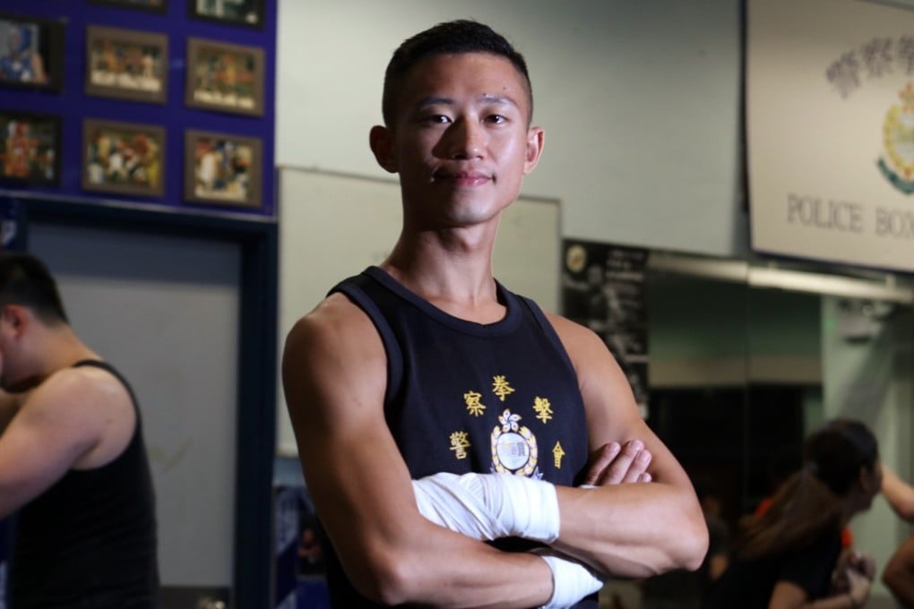 Hong Kong policeman Edwin Ng prepares at the Tai Po Police Boxing Club ahead of his second professional fight. Photo: Felix Wong