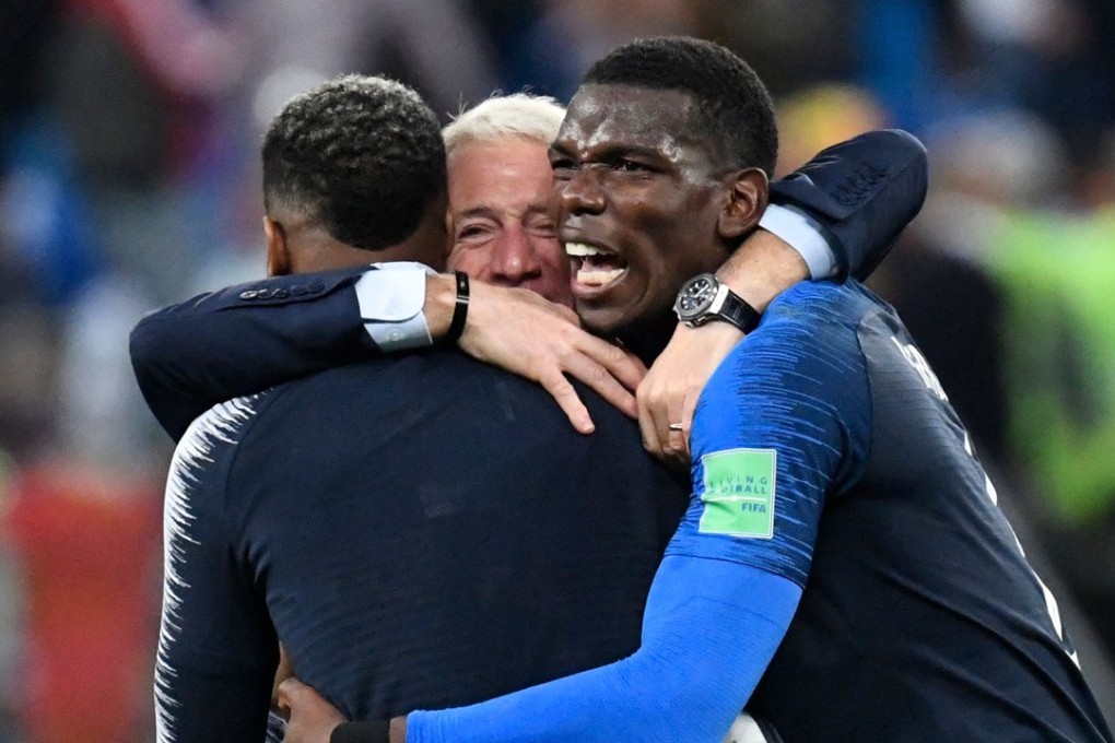 France manager Didier Deschamps (centre) celebrates France’s win with Paul Pogba (right) and Presnel Kimpembe at the end of the World Cup semi-final win over Belgium. Photo: AFP