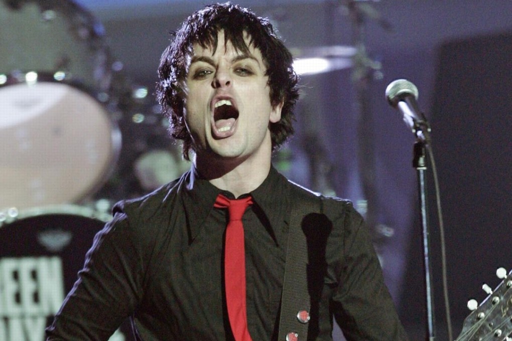 Billie Joe Armstrong performs American Idiot with his group Green Day at the 2005 Grammys in Los Angeles. Photo: AP