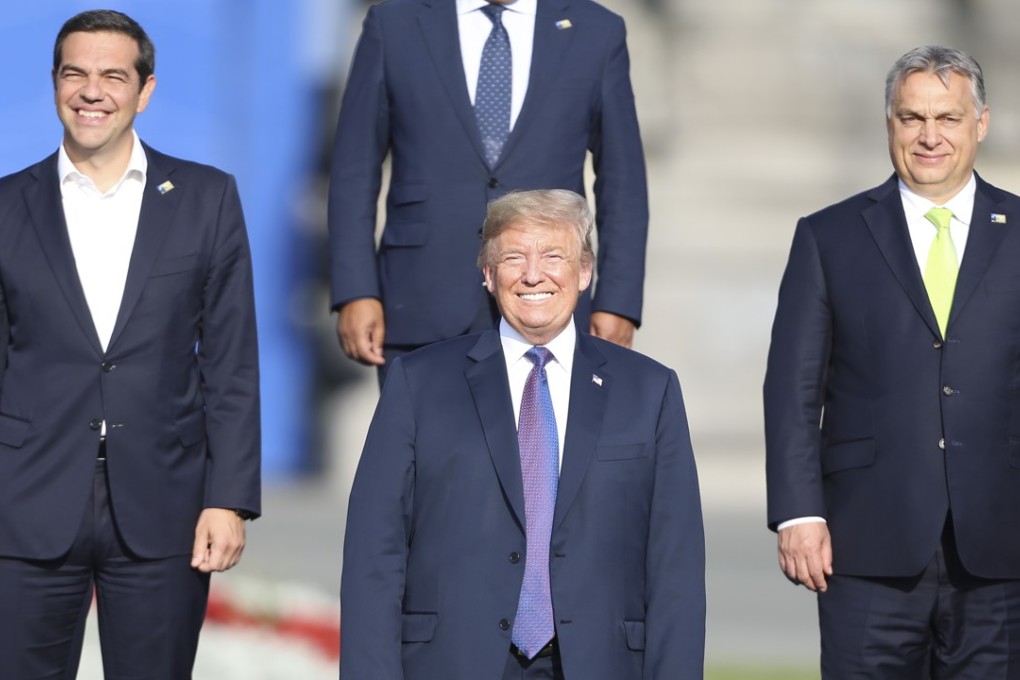 Greek Prime Minister Alexis Tsipras (left), US President Donald Trump and Hungarian Prime Minister Viktor Orban (right) take part in the family photo session during Nato summit in Brussels, Belgium, on Wednesday. Photo: Xinhua
