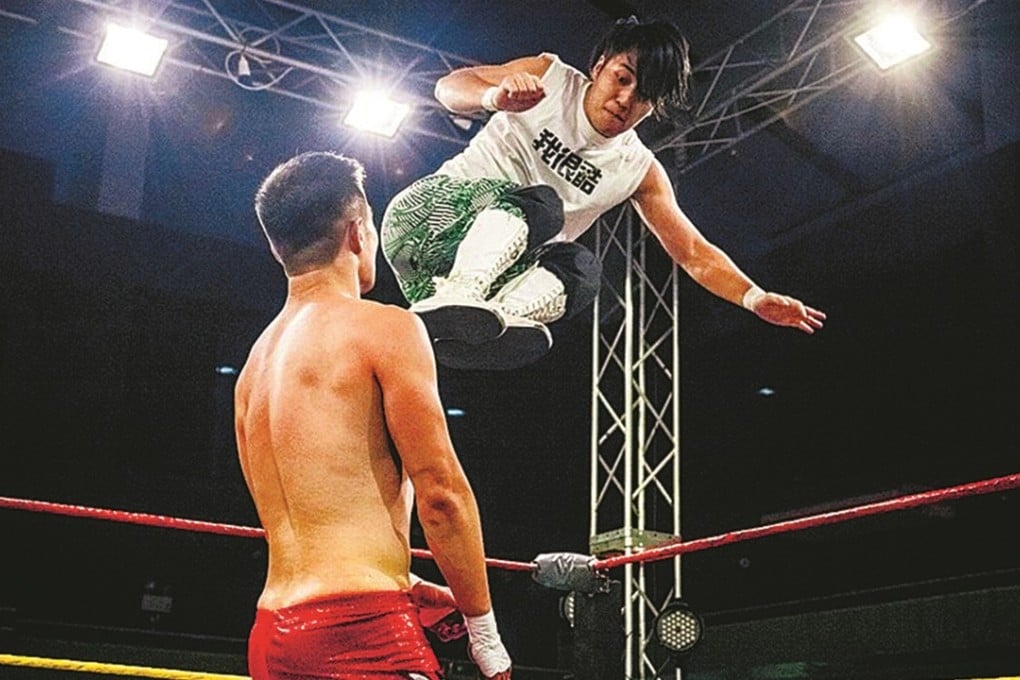Wrestler Ho Ho Lun jumps from the top rope at an opponent during his WWE career. Photo: WWE