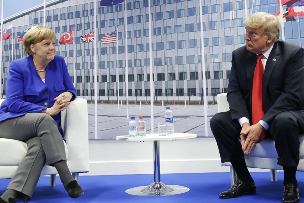 US President Donald Trump and German Chancellor Angela Merkel during their bilateral meeting on Wednesday in Brussels, Belgium. Photo: AP