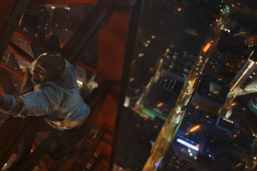Dwayne Johnson in a still from Skyscraper (category IIA), directed by Rawson Marshall Thurber. Neve Campbell and Chin Han co-star.