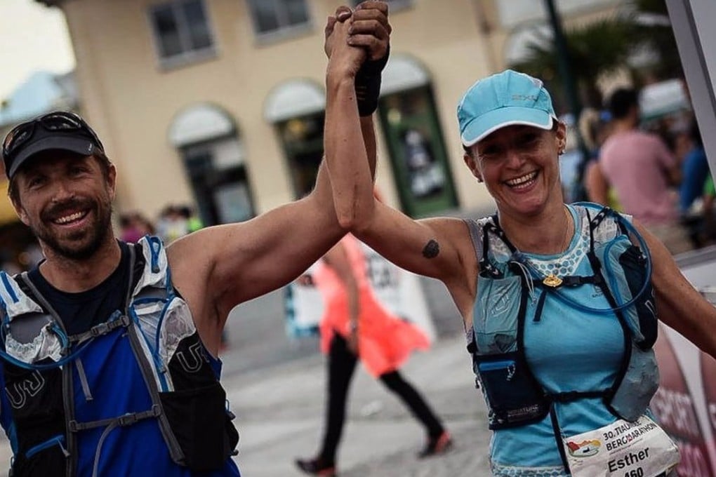 Paul Niel and Esther Roling finish the race around Lake Traunsee. Photo: Sportograf