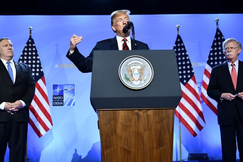 US President Donald Trump, flanked by US Secretary of State Mike Pompeo (left) and national security adviser John Bolton. Photo: AFP