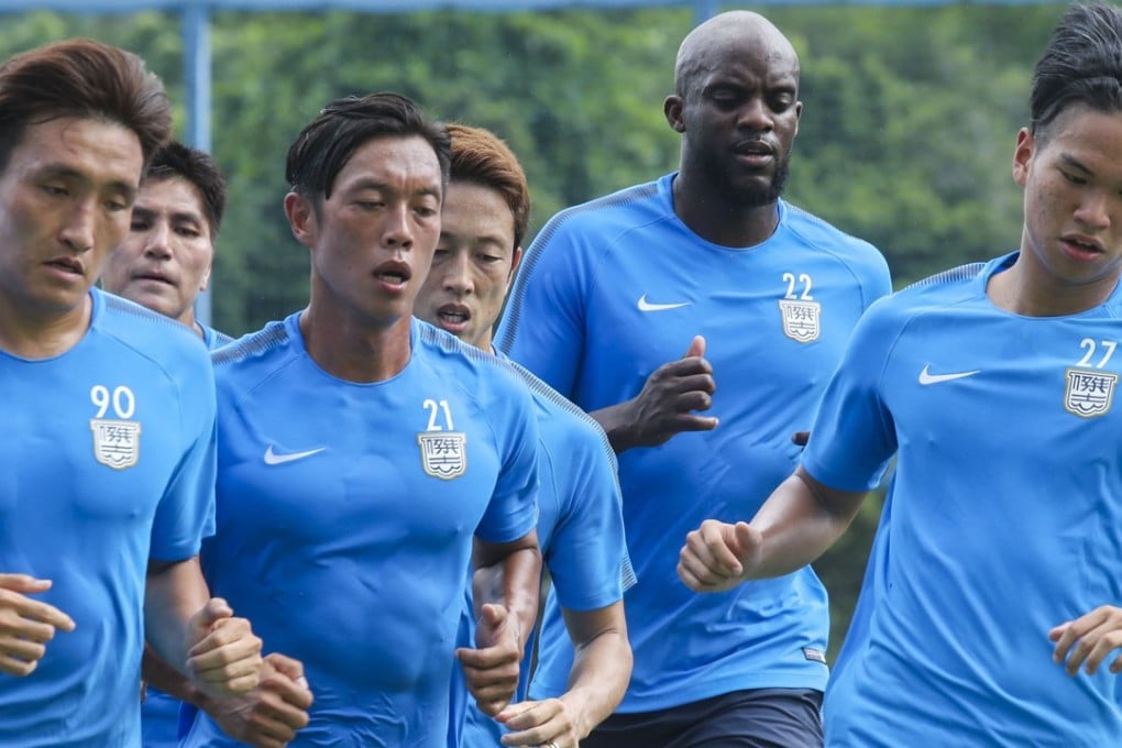 Momo Sissoko (second from right) undergoes his first training session for Kitchee at Sha Tin. Photo: K. Y. Cheng