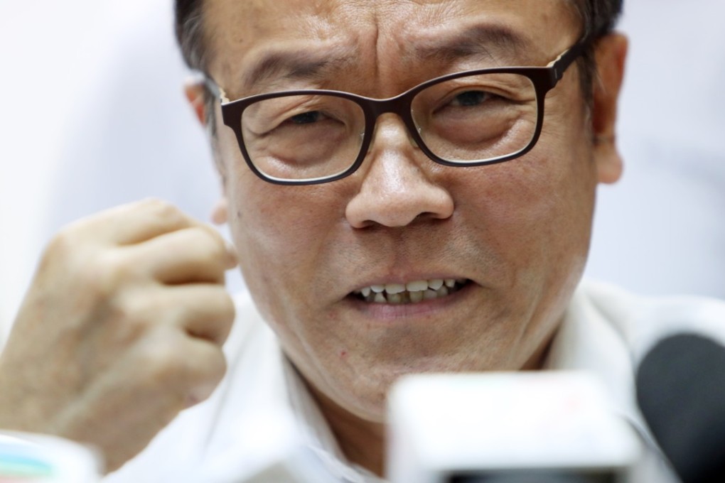 Frederick Fung looks ready to leave the party he helped found. Photo: Winson Wong