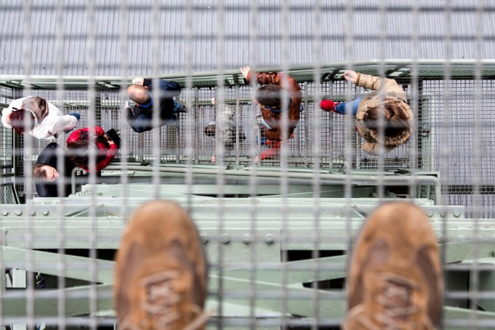 Performing tasks near the edge of a balcony formed part of the experimental VR therapy for people with a fear of heights. Photo: Alamy