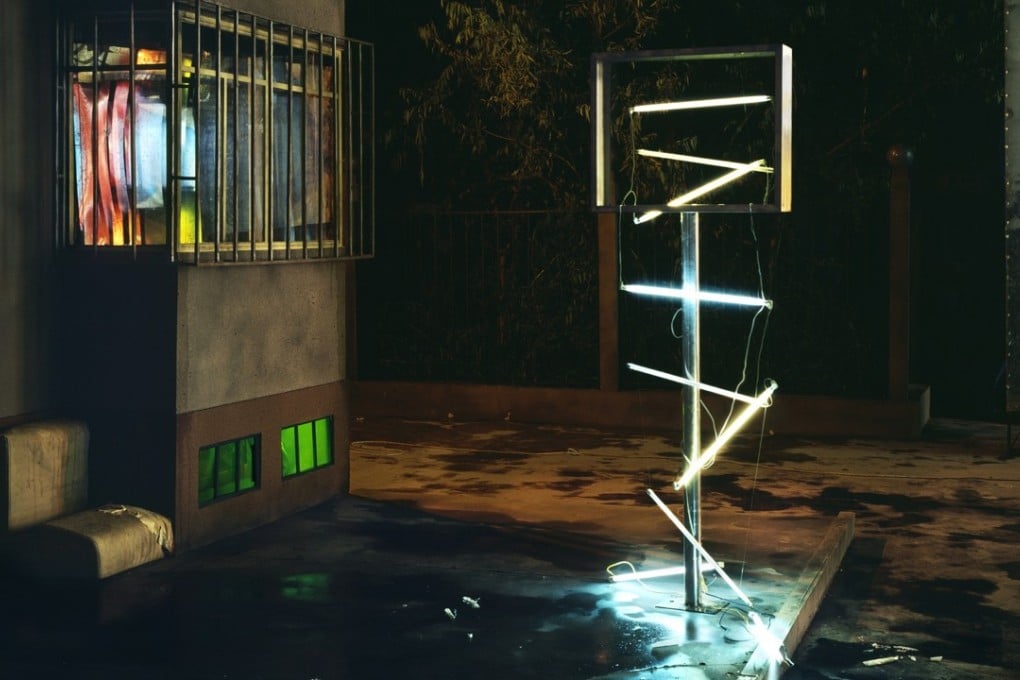 In Chen Wei, Falling Light (2015), Beijing-based Chen creates miniature replicas of nameless street corners in his studio and then photographs them under dramatic lighting.