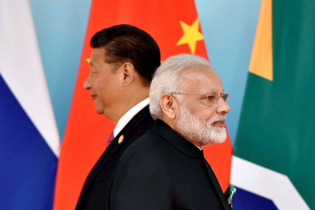 Chinese President Xi Jinping (left) and Indian Prime Minister Narendra Modi attend the BRICS Summit in Xiamen, China, last year. The summit will be held in South Africa this year. Photo: reuters