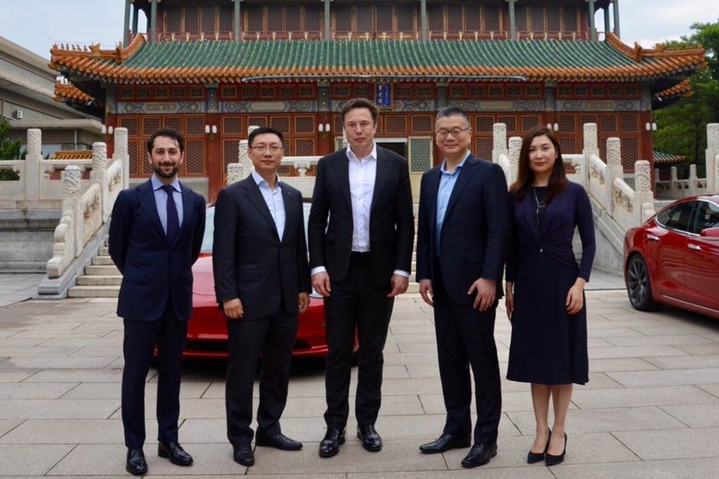 Tesla chief Elon Musk (centre) visits Zhongnanhai in Beijing for a meeting with Chinese Vice-President Wang Qishan on Thursday. Source: Twitter