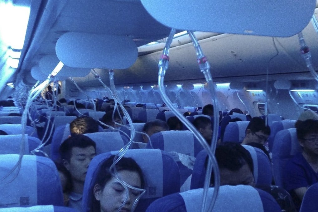Oxygen masks dropped from the ceiling of the Boeing 737 after the plane’s sudden descent half an hour after it took off from Hong Kong International Airport. Photo: Weibo