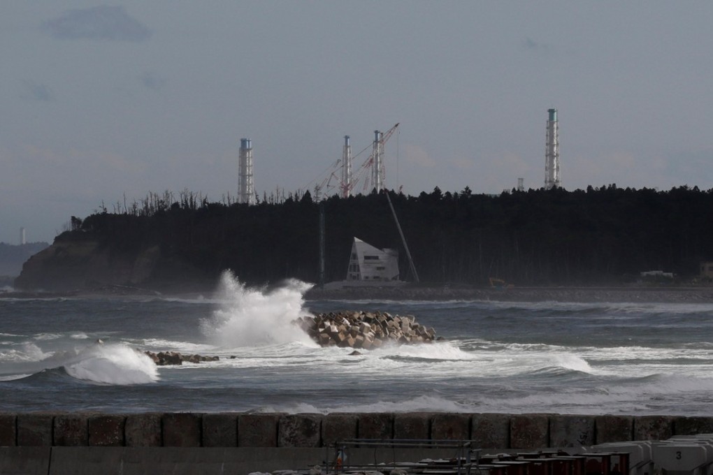 Cranes and chimneys at the tsunami-crippled Fukushima Daiichi Nuclear Power Plant. Photo: Reuters