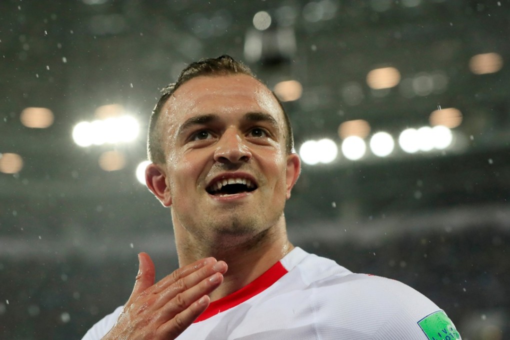 Xherdan Shaqiri celebrates a Switzerland victory at the World Cup. Photo: Reuters