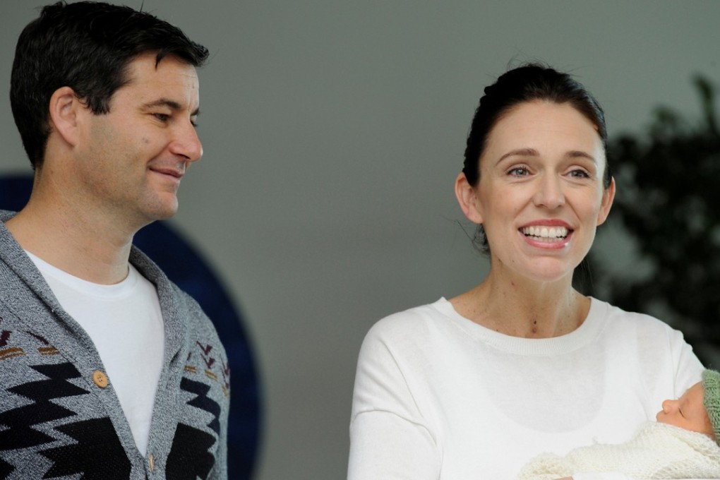 New Zealand Prime Minister Jacinda Ardern carries her newborn baby, Neve Te Aroha Ardern Gayford, with her partner, Clarke Gayford. Photo: Reuters