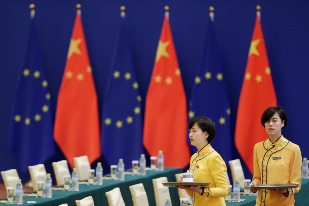 Attendants prepare for an EU-China summit last month. Photo: Reuters