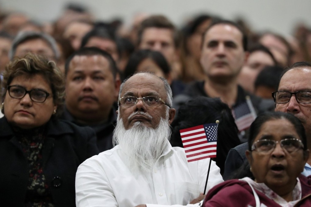 Immigrants participate in a naturalisation ceremony to become new US citizens in Los Angeles on March 20. Photo: Reuters