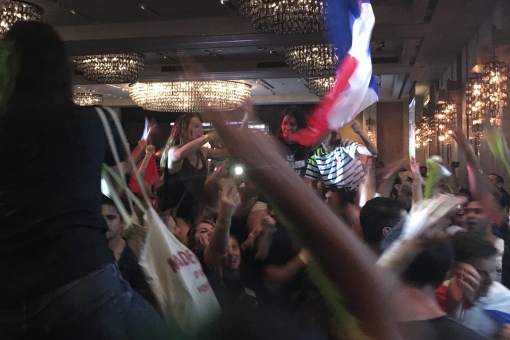 France fans react while watching the 2018 Fifa World Cup final between France and Croatia at the Kerry Hotel in Hung Hom. Photo: Jonathan White