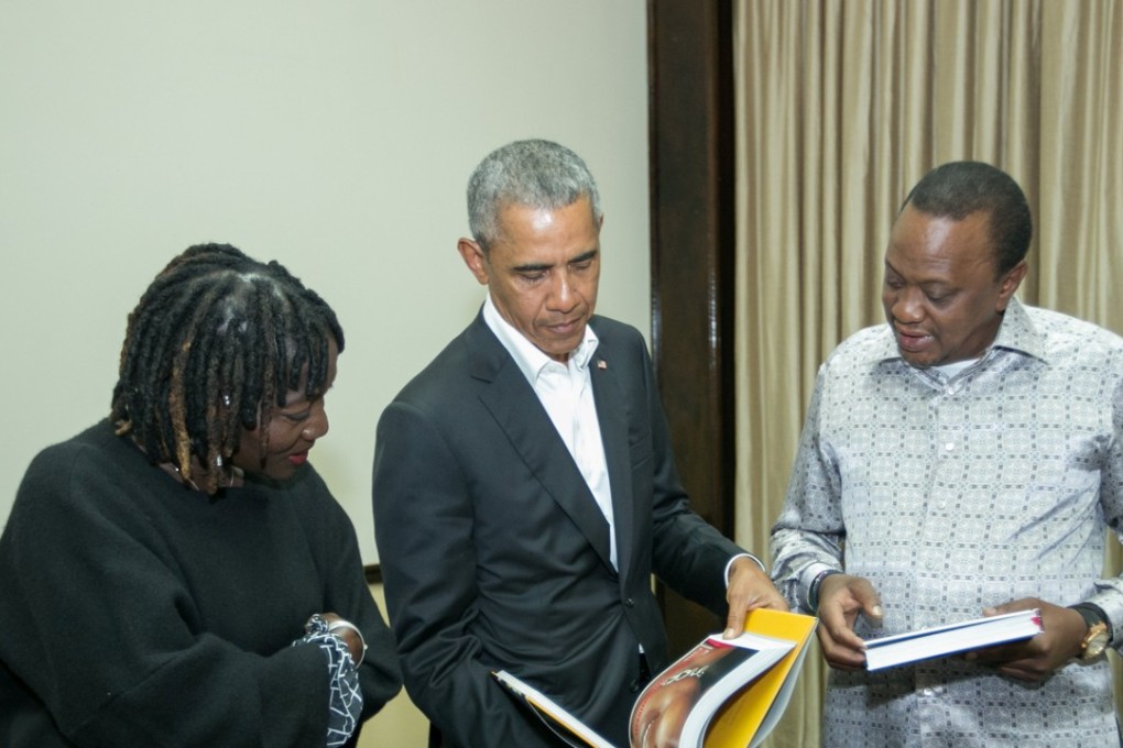 From left, Auma Obama with her brother, former US President Barack Obama, and Kenya's President Uhuru Kenyatta in Nairobi on Sunday. Photo: Presidential press service via Reuters