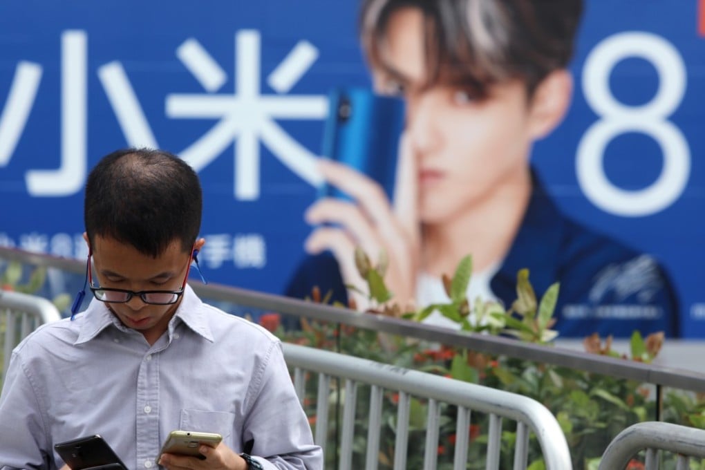 Xiaomi is at the centre of a war of words between the Hong Kong stock exchange and the operators of the Shanghai and Shenzhen bourses. Photo: Sam Tsang