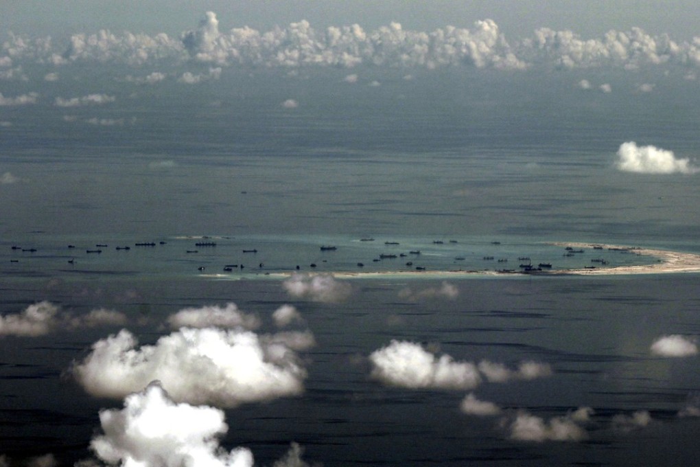 File photo of land reclamation by China on Mischief Reef in the Spratly Islands, west of Palawan, Philippines. Photo: Reuters
