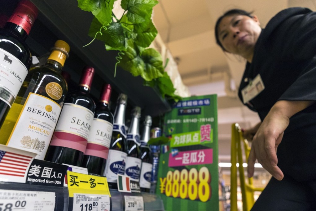 Bottles of wine imported from the US sit on a store shelf in Guangzhou on July 14. Politicians get agitated over the fact that most consumers pay attention only to value for money in making their buying decisions, caring little where the goods come from. Photo: EPA-EFE