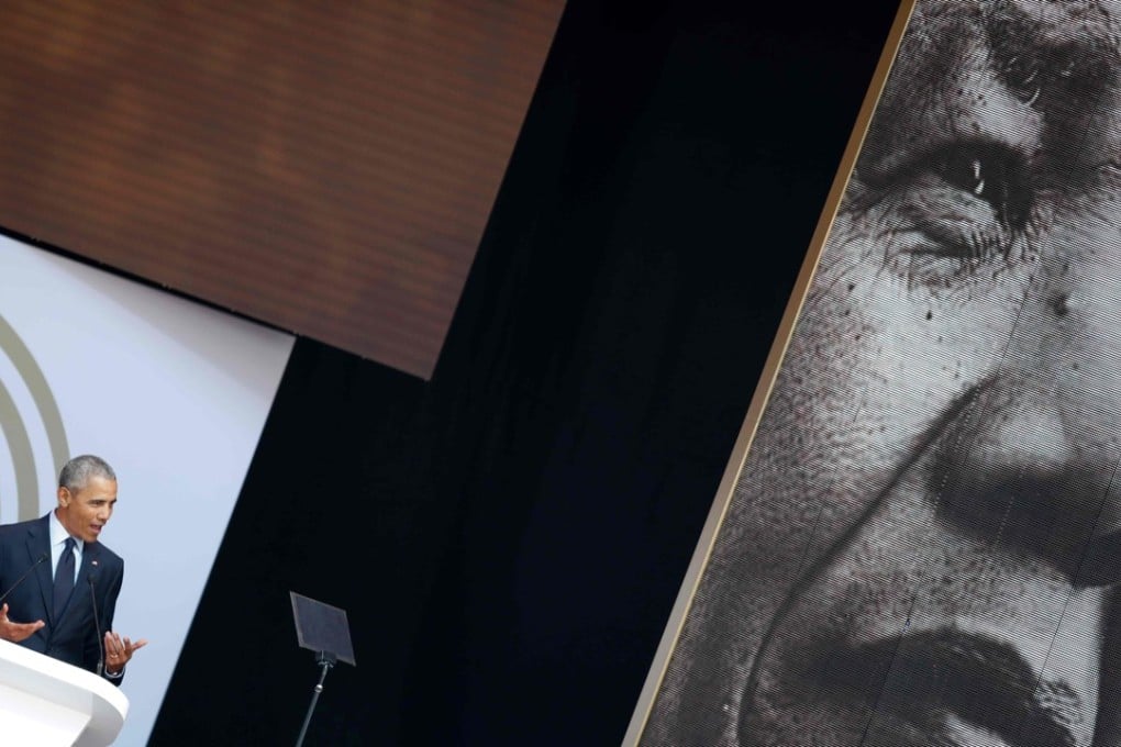 Former US president Barack Obama speaks during the 2018 Nelson Mandela Annual Lecture at the Wanderers cricket stadium in Johannesburg on Tuesday. Photo: Agence France-Presse