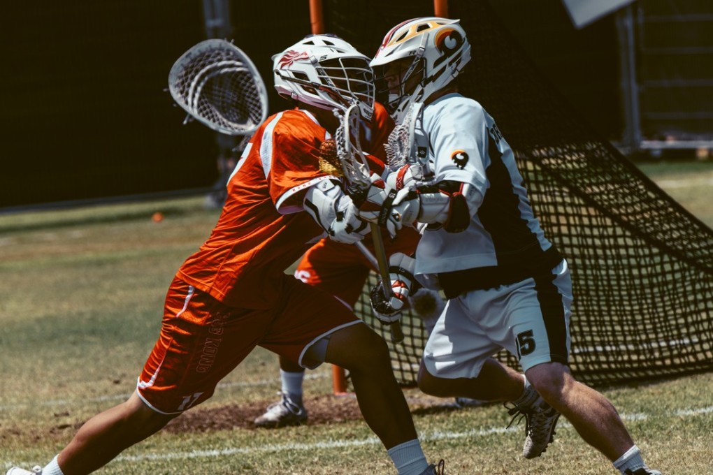 Hong Kong struggle against Germany in the championship bracket. Photos: Hong Kong Lacrosse Association
