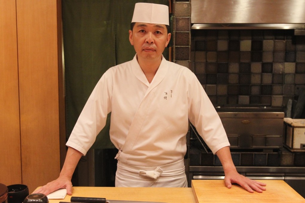 Yoshiharu Kakinuma, chef of the three-Michelin-star Sushi Shikon in Sheung Wan, explains sushi etiquette. Photo: Roy Issa