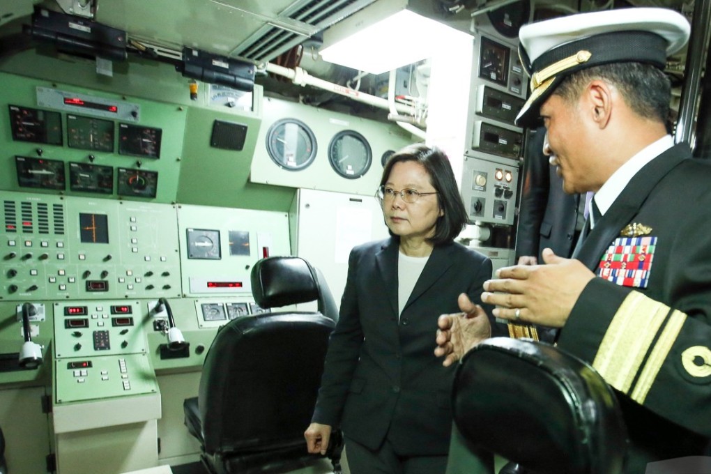 Taiwanese President Tsai Ing-wen inspects the inside of a submarine at the Zuoying naval base in Kaohsiung, Taiwan, in March last year. The Taiwanese government wants to build eight diesel-electric submarines to bolster its four outdated vessels. Photo: EPA / Taiwan Military News Agency handout