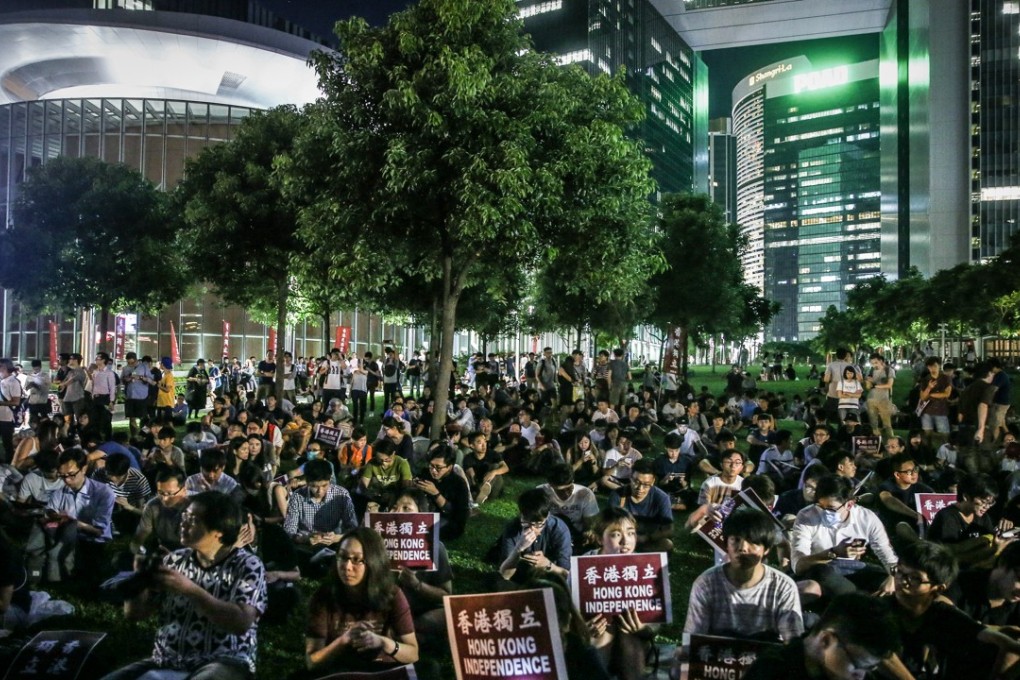 Hong Kong National Party members listen to a speech from convenor Andy Chan Ho-tin in Hong Kong’s Tamar Park. Photo: Sam Tsang