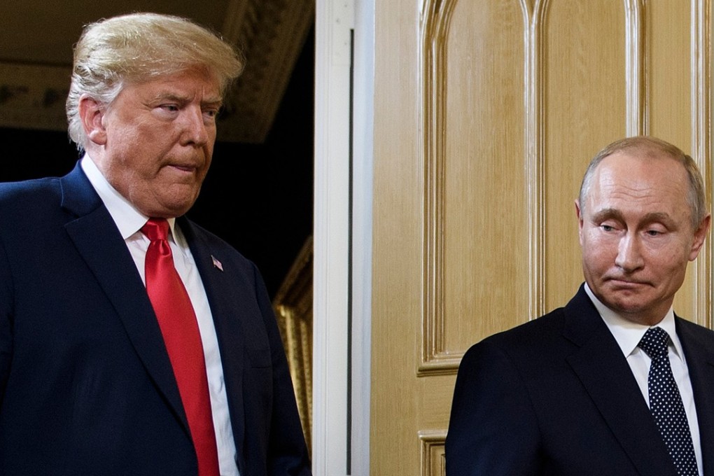 US President Donald Trump and Russian President Vladimir Putin arrive for their summit in Helsinki on July 16. Photo: AFP