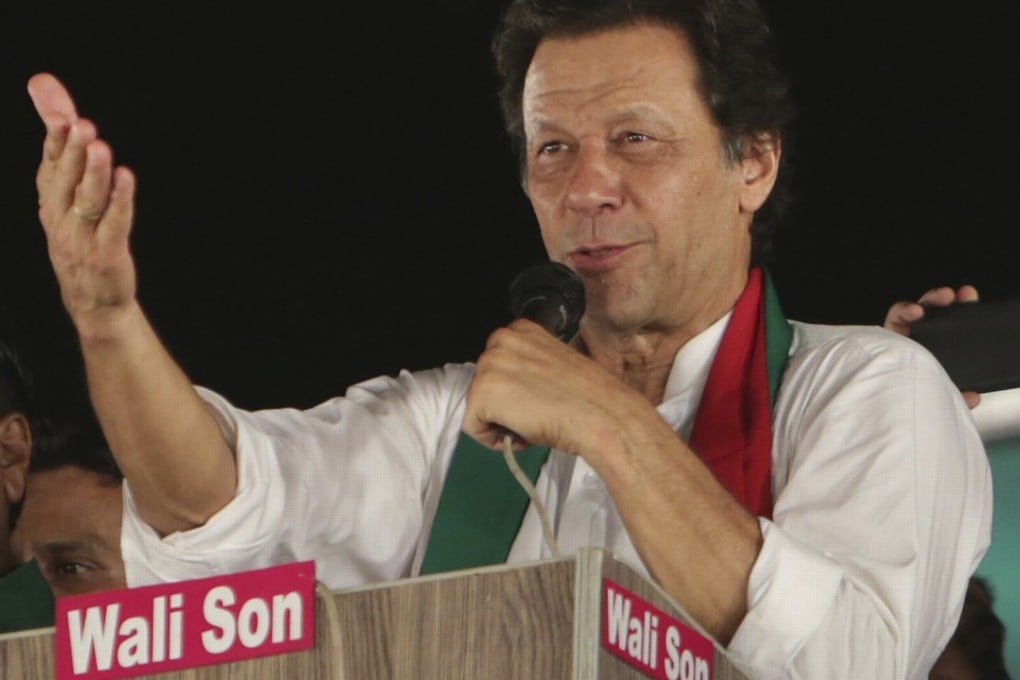 Pakistani politician Imran Khan, chief of the Pakistan Tehreek-e-Insaf party, addresses supporters during an election campaign in Lahore, Pakistan. Photo: AP