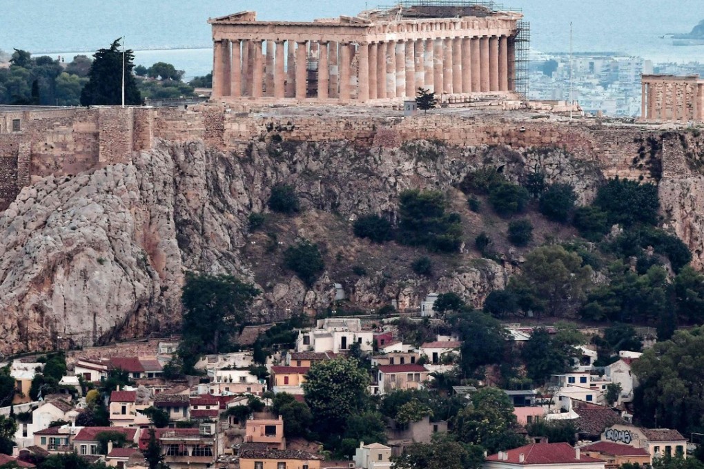 The tiny Anafiotika neighbourhood of Athens beneath the Acropolis – a scenic stone village seemingly lifted straight out of the Cyclades. islands. Photo: AFP