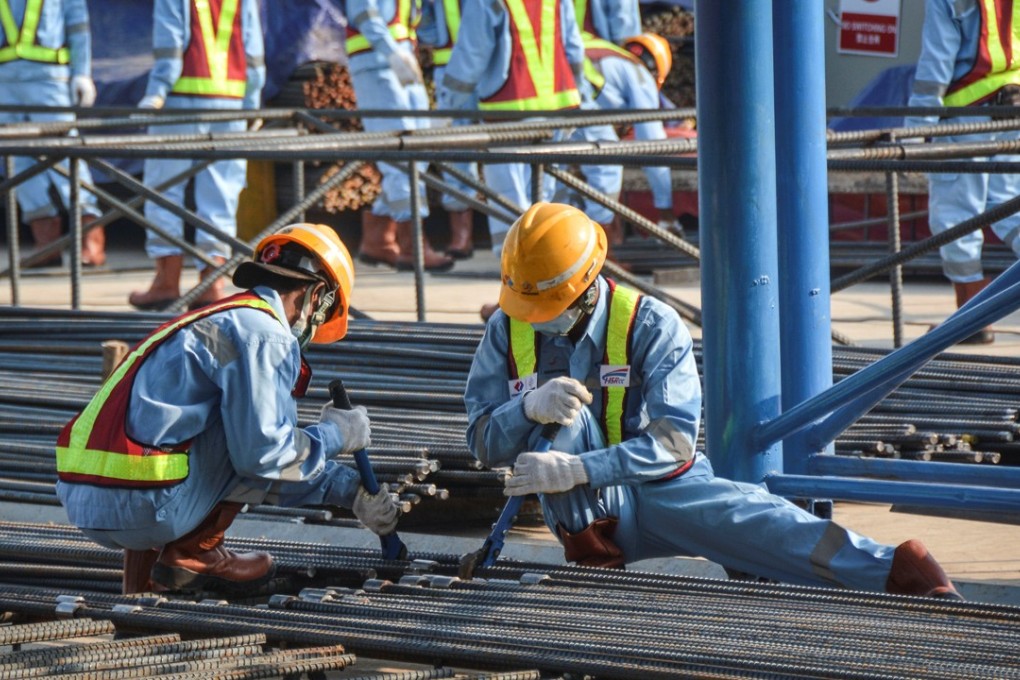Workers prepare reinforcing steel at a tunnel being built for the China-financed Jakarta-Bandung fast train. Jakarta and Beijing signed five infrastructure contracts worth US$23.3 billion in April. Photo: Antara Foto/Reuters