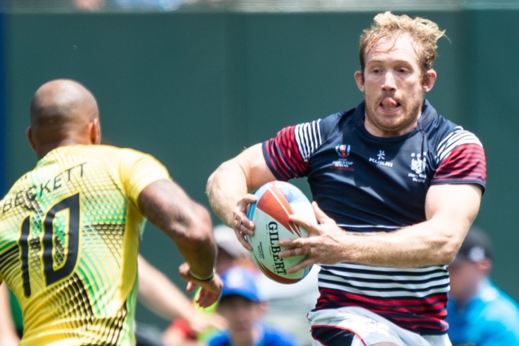Toby Fenn looks for a way through the Jamaican defence. Photos: David Barpal